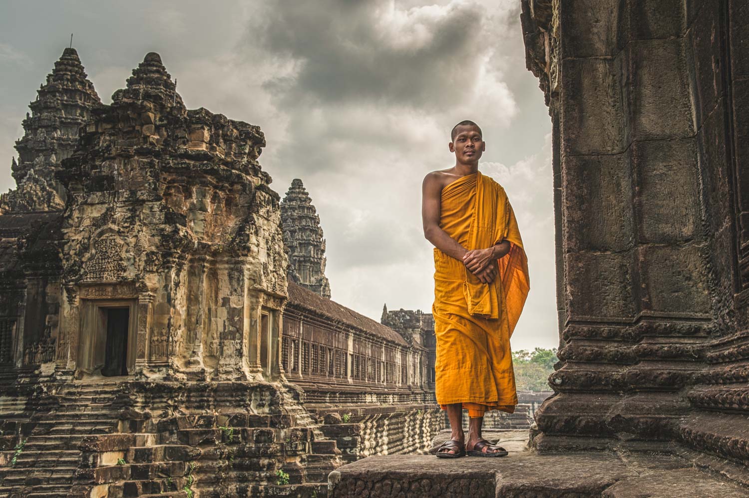 Buddhist Monk outside part of the enormous complex that is Angkor Wat;&nbsp;Nikon D4S, 32mm, f/8, 1/160s, ISO 100