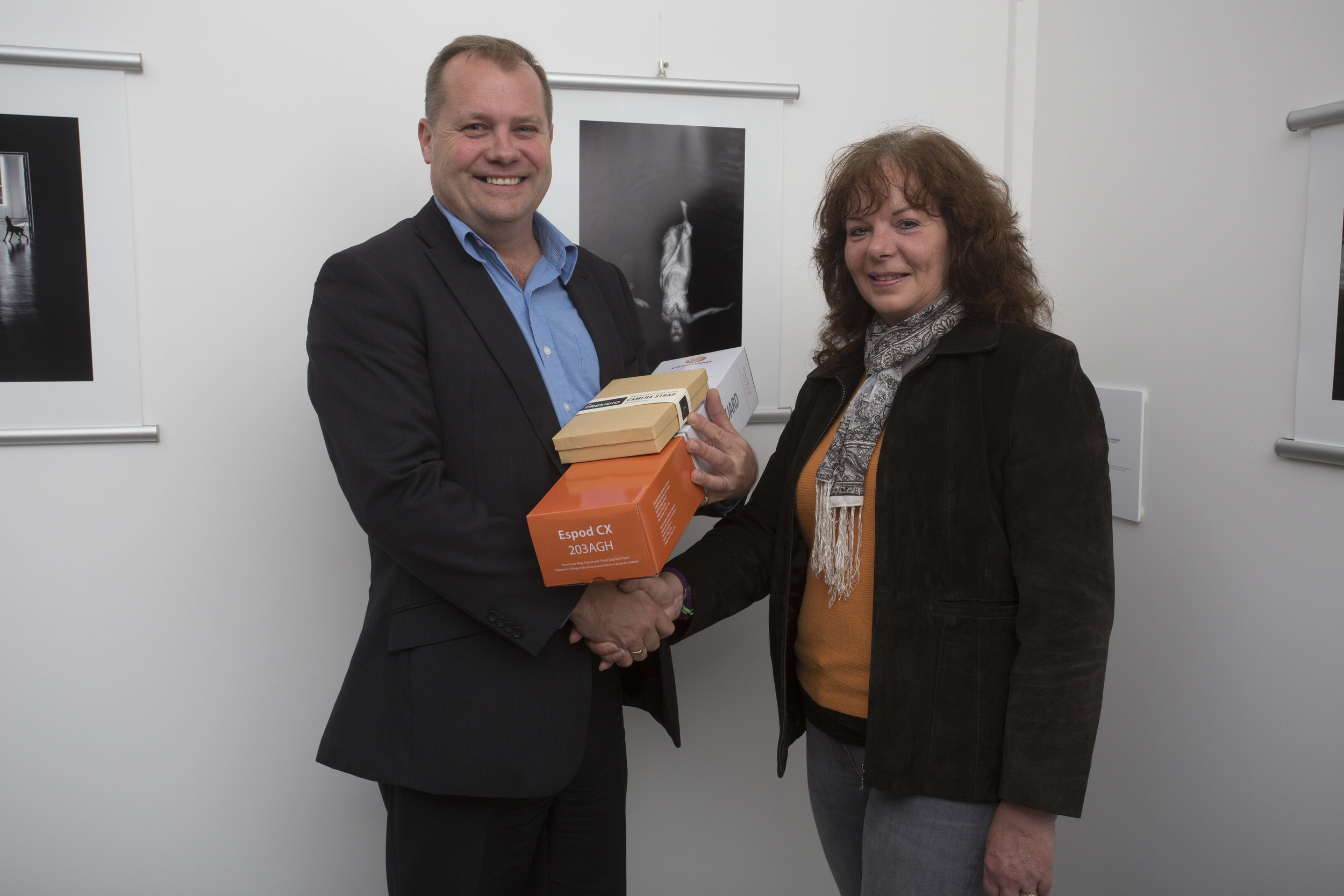  Gerard Emery from CRK hands over the Vanguard prize pack to third-placing Monochrome photographer, Karen Moffat-Mcleod 
